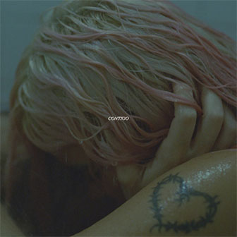 "Contigo" by Karol G & Tiesto "Contigo" by Karol G & Tiesto